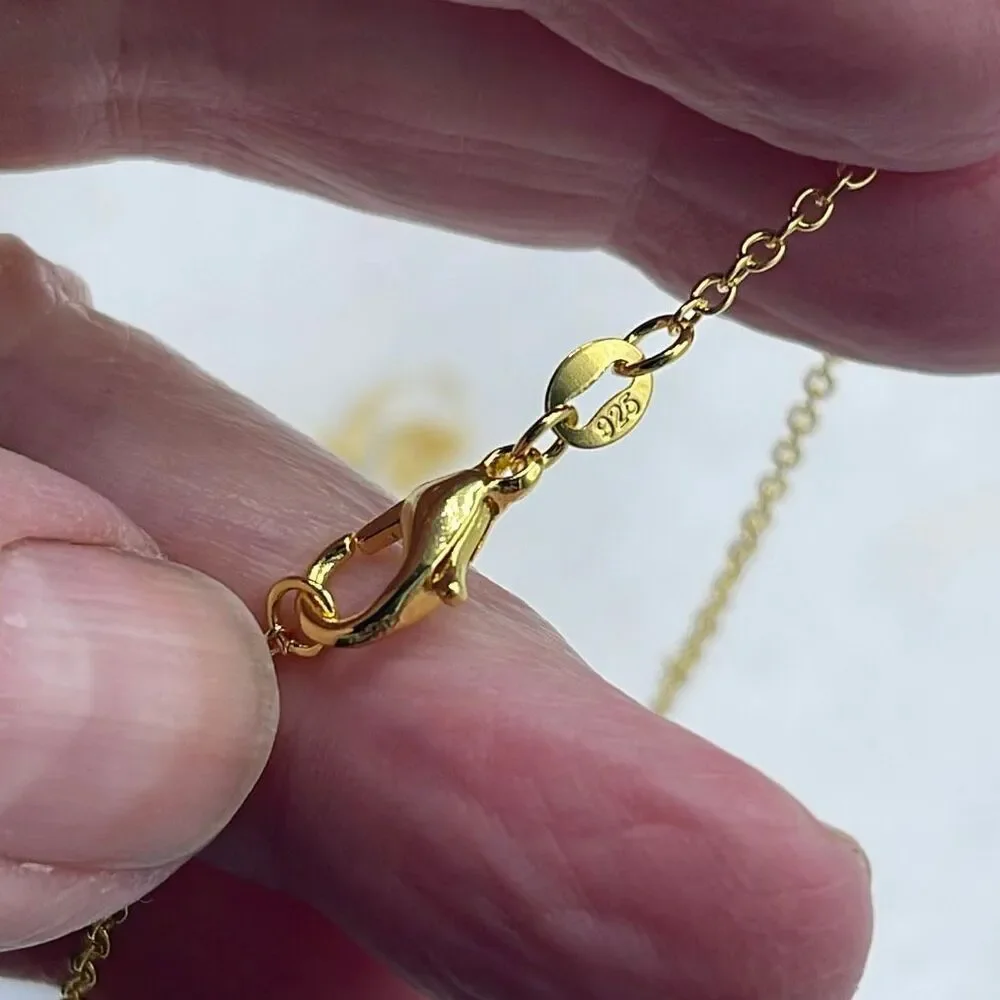 Floral art glass pendant on a 925 plated gold chain.